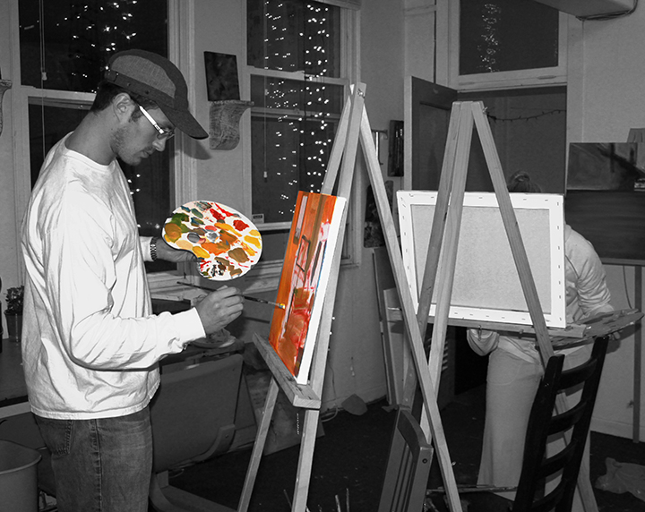 A student painting an orange still life on an easel during a lesson in the studio.
